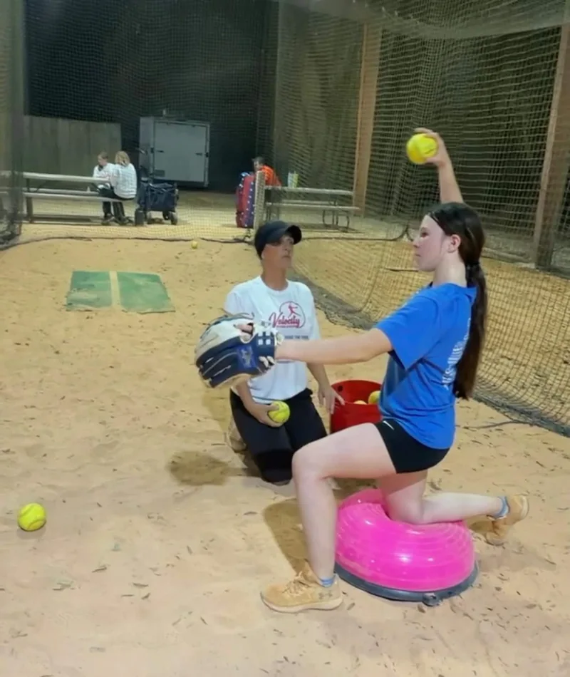 Casey working one-on-one with a pitcher on balance